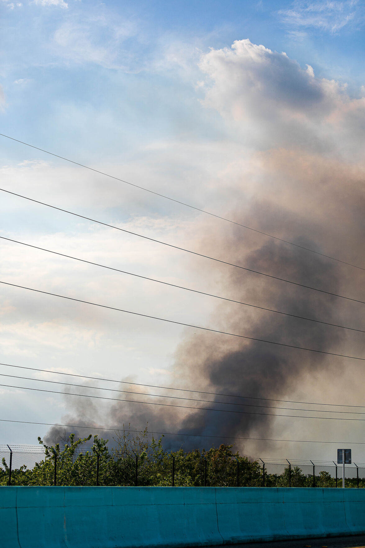 This is a view of the smoke cloud from a portion of the fire taken looking west from US-1 around Mile Marker 123.5